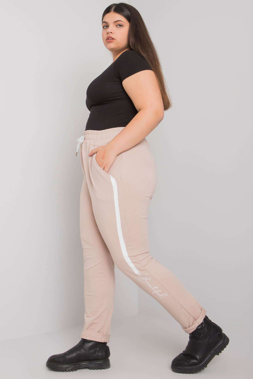 Bēšas liela izmēra treniņbikses ar...