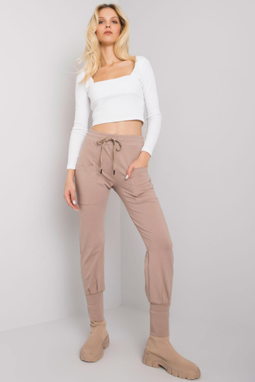 Tumši bēšas sporta bikses...