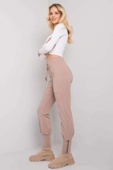 Tumši bēšas sporta bikses... 2