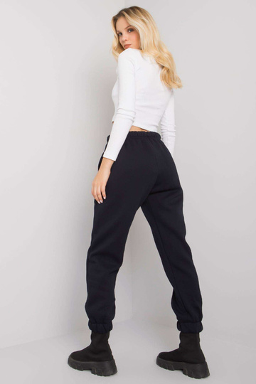 Tumši zilas treniņbikses ar... 2