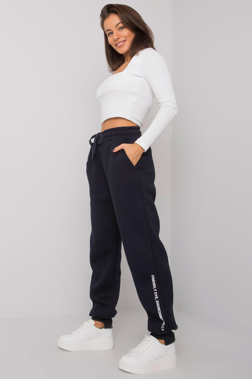 Tumši zilas sieviešu treniņbikses...