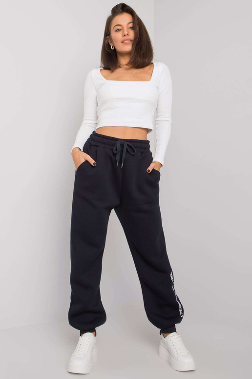 Tumši zilas sieviešu treniņbikses...