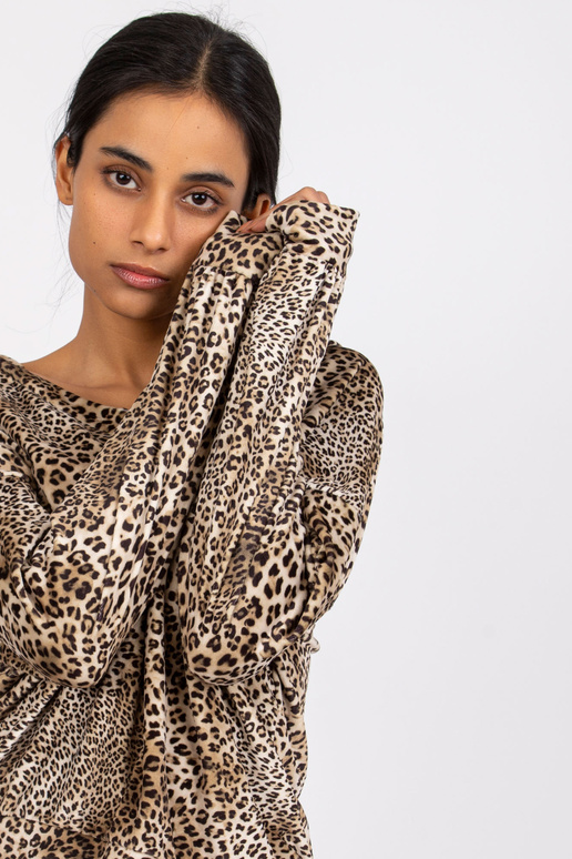 Bēša un melna Reigana leoparda raksta... Bēša un melna Reigana leoparda raksta...