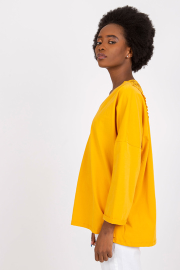 Gaiši oranža blūze ar...