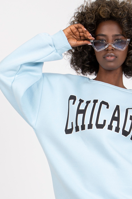 Gaiši zils sporta krekls ar Madeiras...