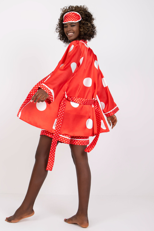 Sarkans naktsgaldiņš ar peldmēteli