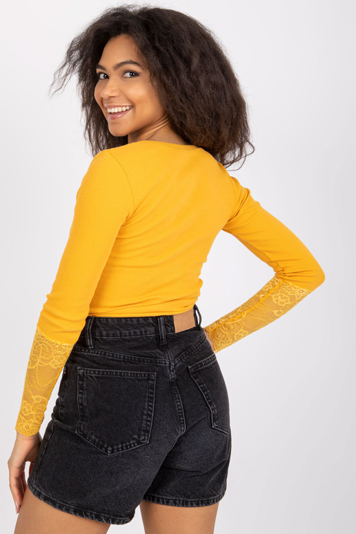 Gaiši oranža rievota blūze ar...