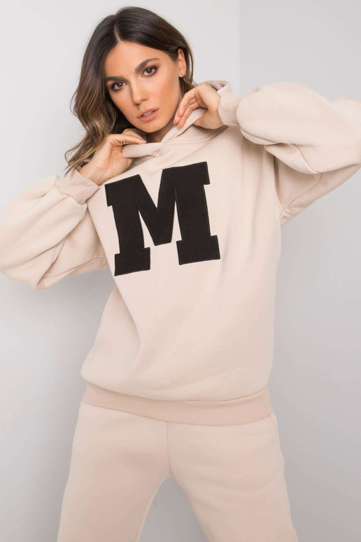 Bēšs sieviešu sporta tērpu komplekts...