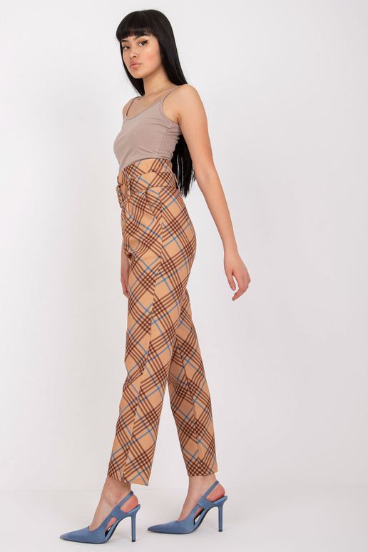 Bēšas un zilas krāsas rūtainas auduma...