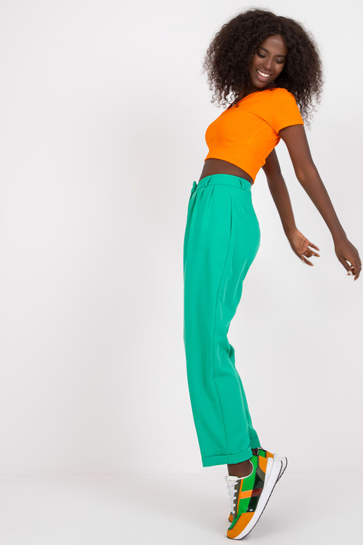 Zaļas sieviešu auduma bikses ar...