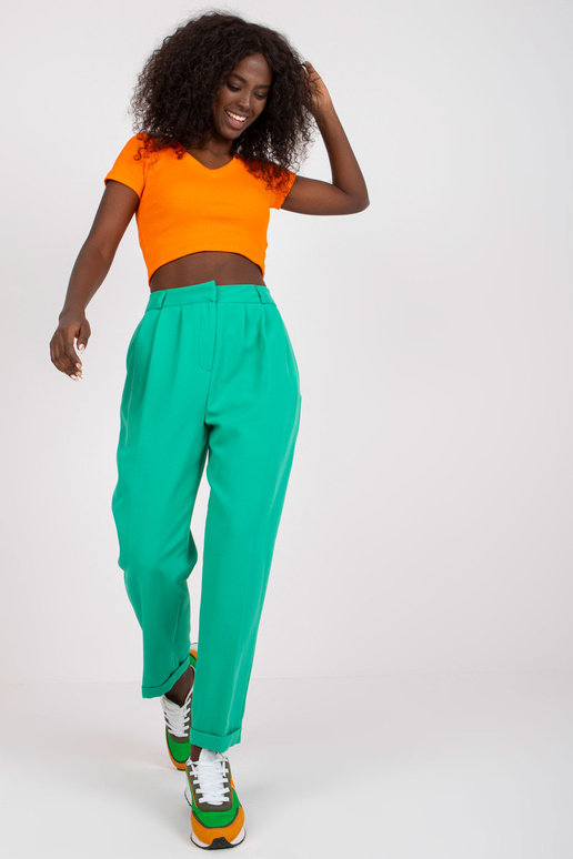 Zaļas sieviešu auduma bikses ar...