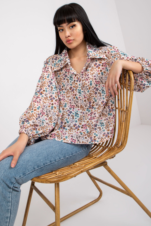 Bēša gaisīga blūze ar ziedu apdruku...