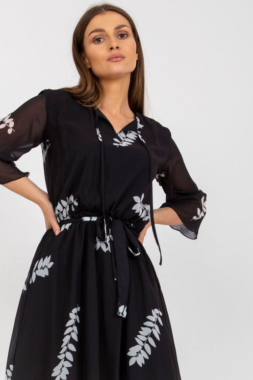 Melna asimetriska kleita ar apdrukām...