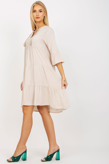 Gaiši bēša oversize kleita...