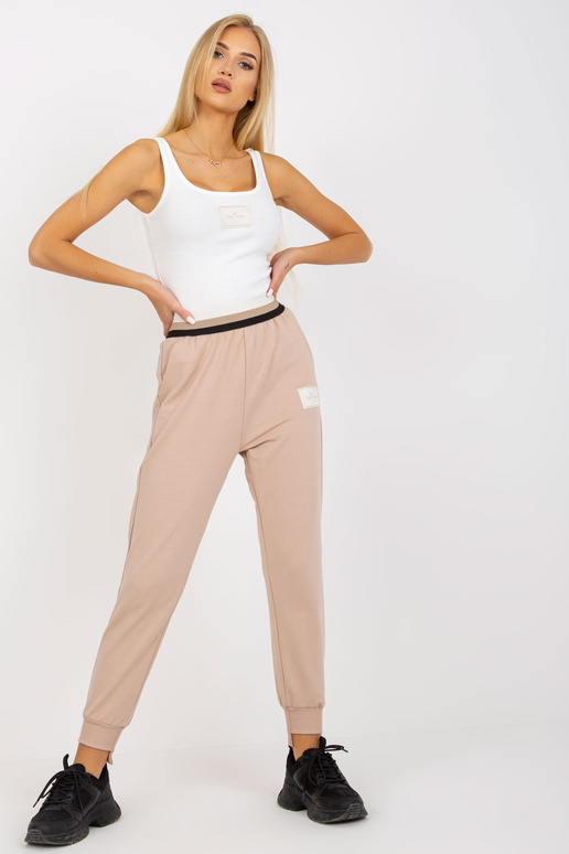 Bēšas treniņbikses ar augstu...