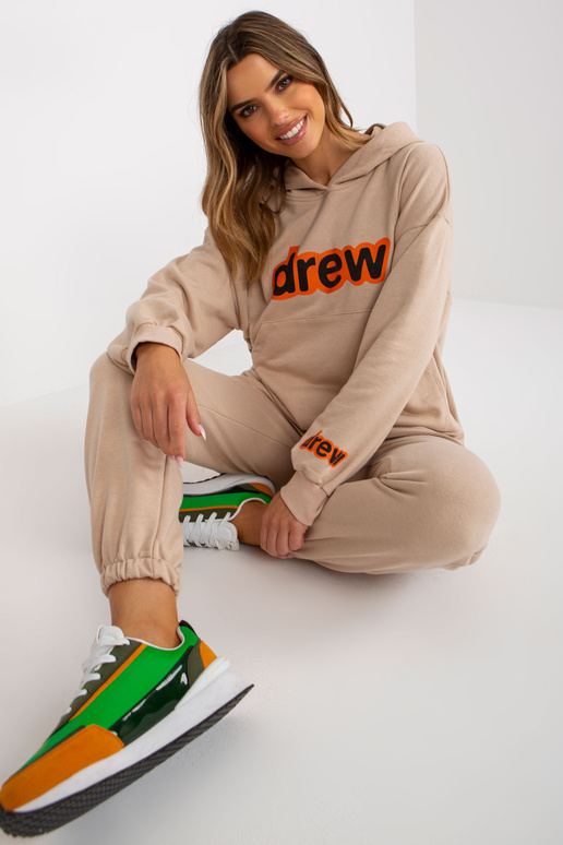 Bēšs divdaļīgs treniņtērpa komplekts...