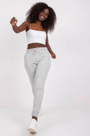 Pelēkas gludas treniņbikses...