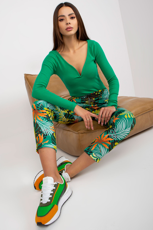 Zaļas raksta sporta bikses ar kabatām