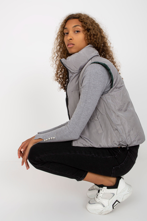 Tumši zaļa īsa dūnu veste ar vatējumu