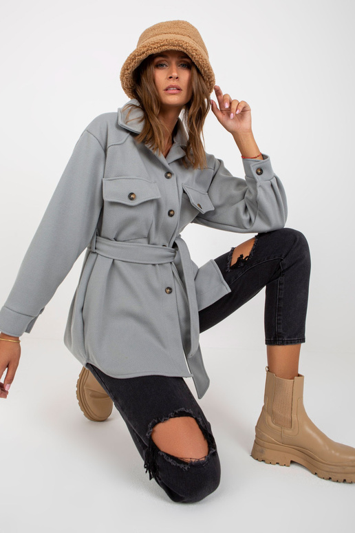 Pelēks viena izmēra virsdrēbju krekls...