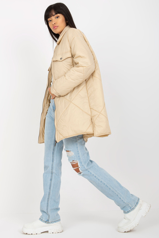 Gaiši bēša stepēta pārejas jaka ar... Gaiši bēša stepēta pārejas jaka ar...