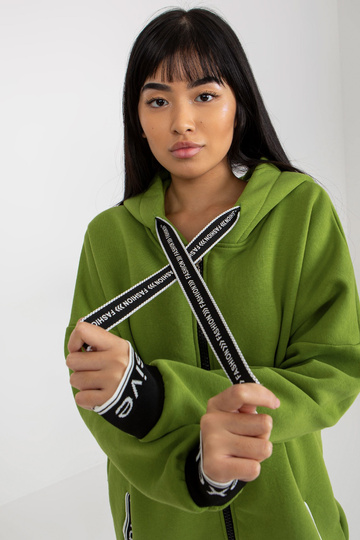 Gaiši zaļš garais džemperis...