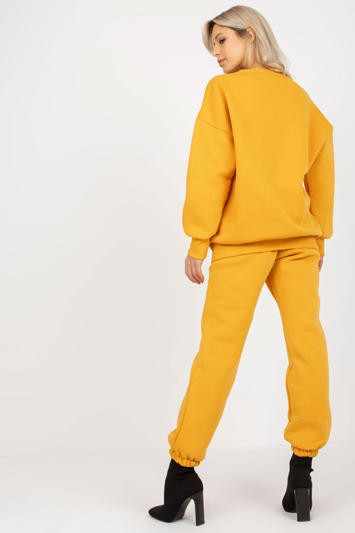 Tumši dzeltens sieviešu sporta kreklu...