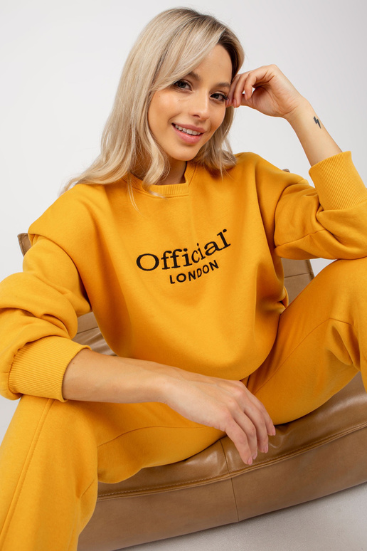 Tumši dzeltens sieviešu sporta kreklu...