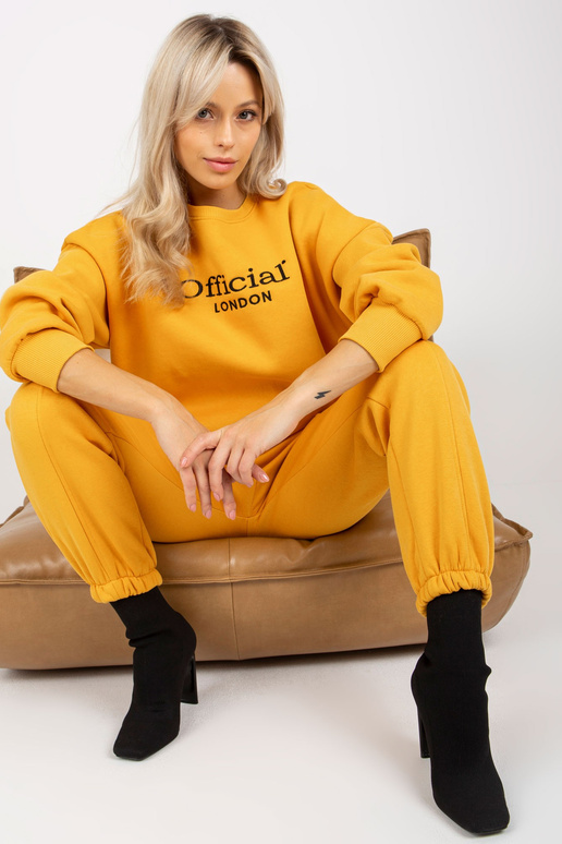 Tumši dzeltens sieviešu sporta kreklu...