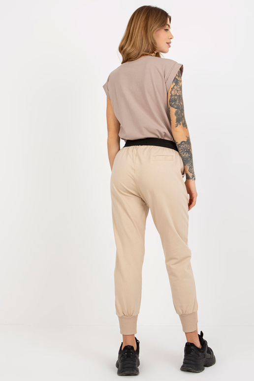 Bēšas pamata treniņbikses ar elastīgu...