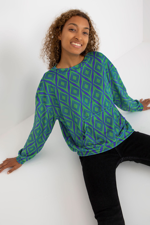 Zaļi un zili raksta velūra džemperis...