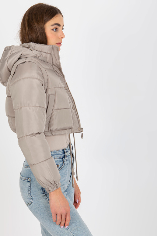 Tumši bēša īsa ziemas jaka ar... Tumši bēša īsa ziemas jaka ar...