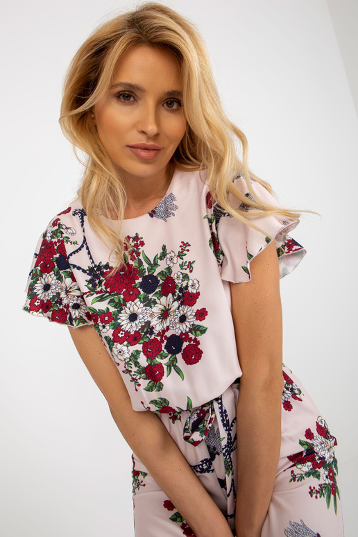 Gaiši rozā sieviešu ziedu kombinezons...