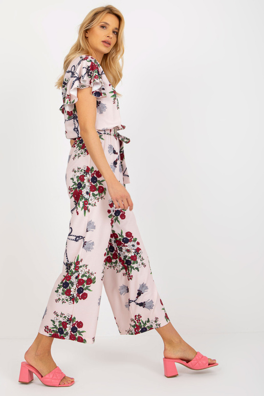 Gaiši rozā sieviešu ziedu kombinezons...