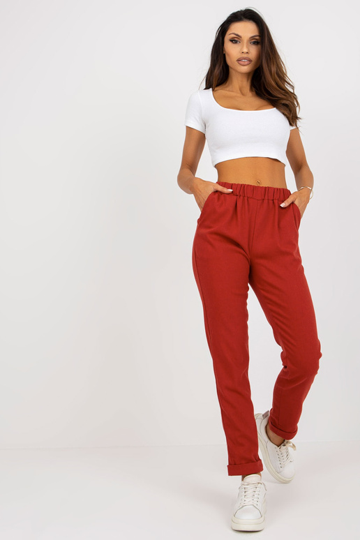 Tumši oranžas auduma bikses ar kabatām