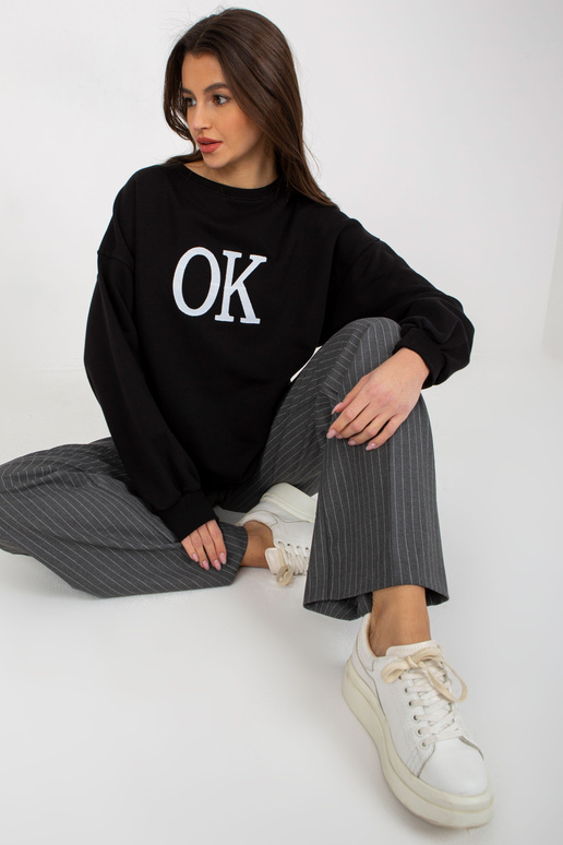 Melna brīvi pieguļoša oversize kapuce...