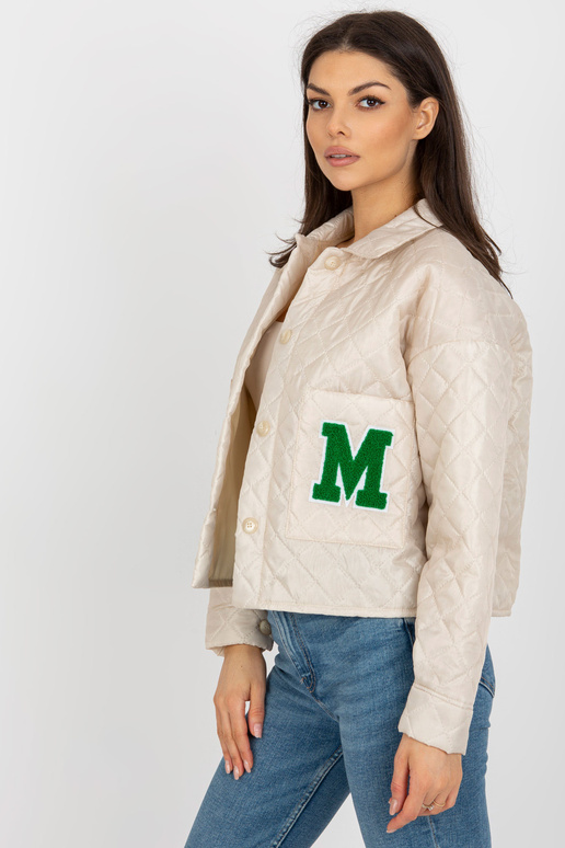 Gaiši bēša pārejas stepēta jaka ar... Gaiši bēša pārejas stepēta jaka ar...