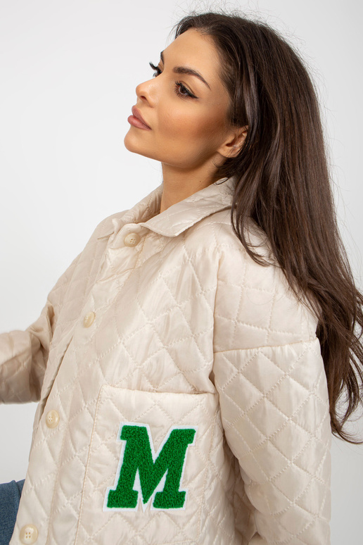 Gaiši bēša pārejas stepēta jaka ar... Gaiši bēša pārejas stepēta jaka ar...