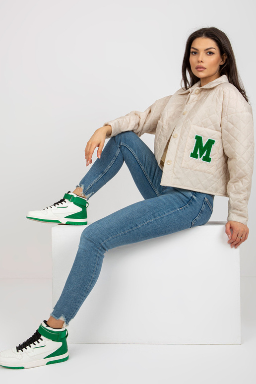 Gaiši bēša pārejas stepēta jaka ar... Gaiši bēša pārejas stepēta jaka ar...