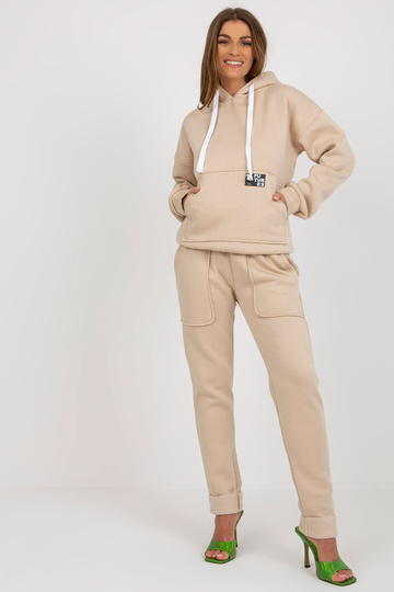 Bēšs sieviešu sporta tērpa...