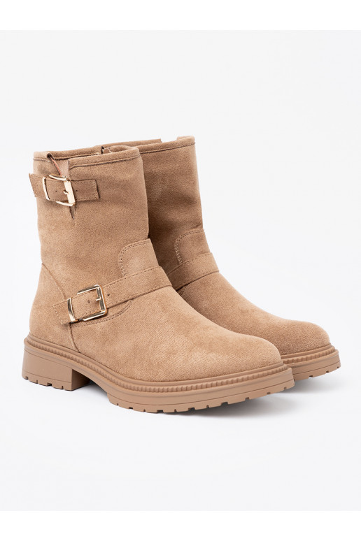 Brūnas krāsas zābaki z ozdobnymi mi klamrami