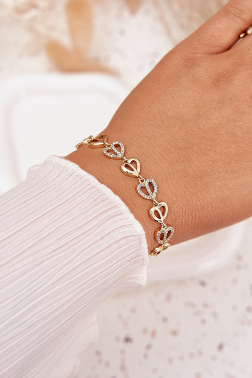 Aproce no nerūsējošā tērauda ar mirdzošiem spīdumiņiem Zelta krāsas