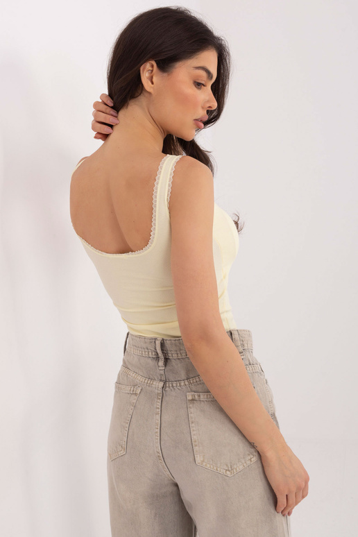 Topiņš gaiši dzeltenā krāsā