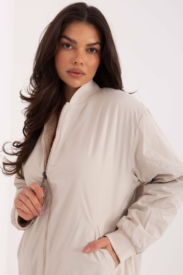 Gaiši smilškrāsas blūzons