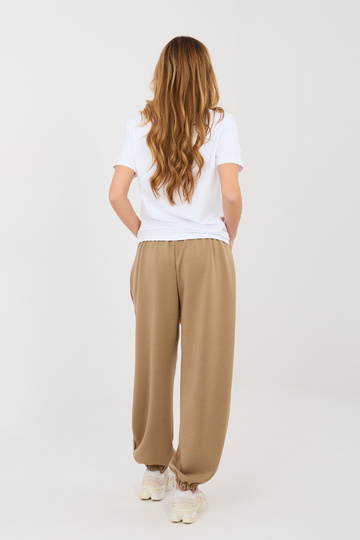 Bikses tumši smilšu krāsā