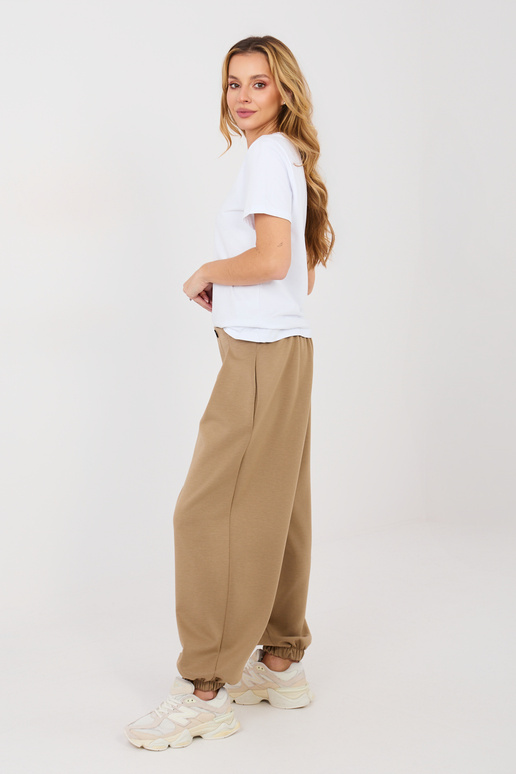 Bikses tumši smilšu krāsā