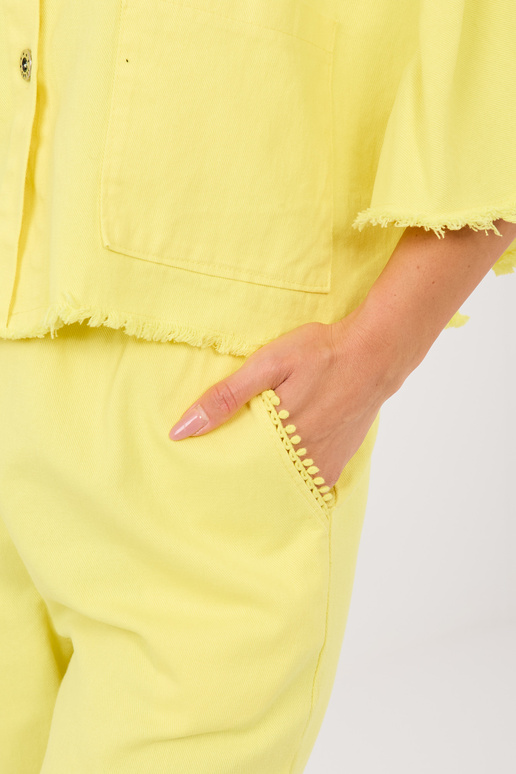 Spilgti dzeltenas bikses