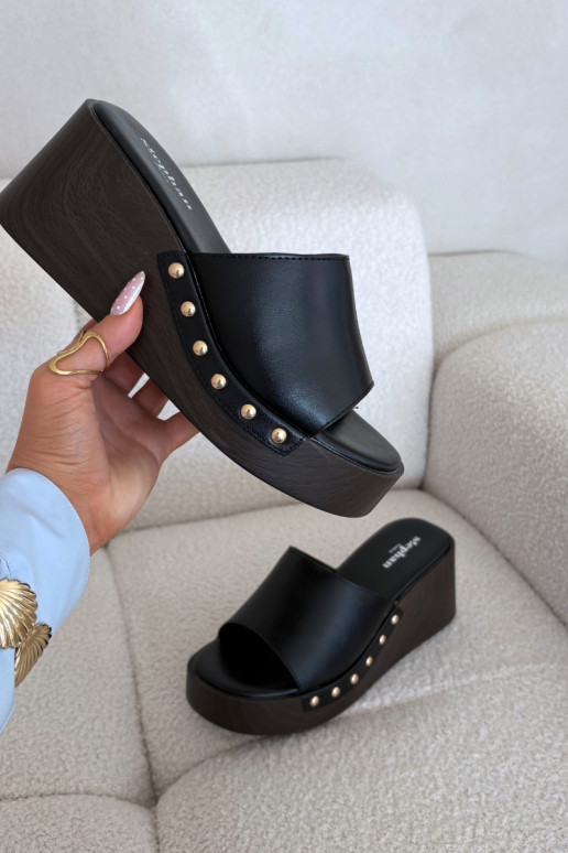 Sieviešu čības uz platformas ar zelta krāsas dzīsliņām melnā krāsā Arionne