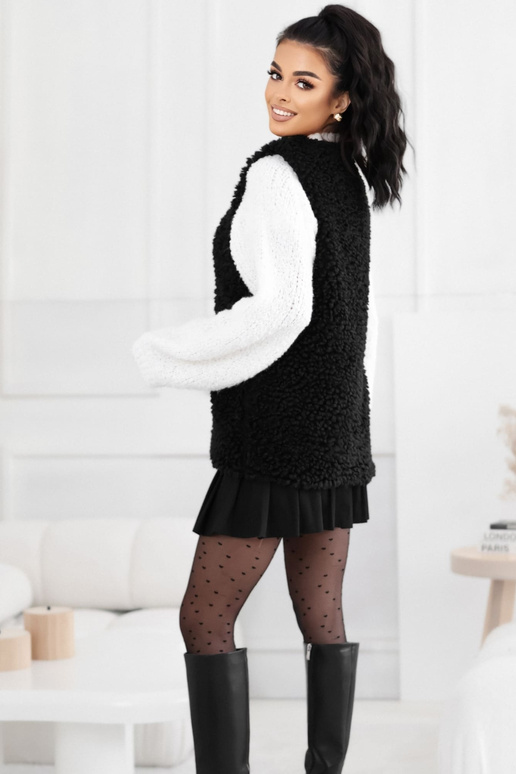 Veste melna