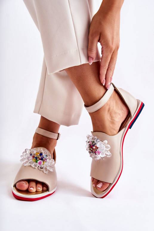 Sandales ar ornamentiem smilšu krāsas...